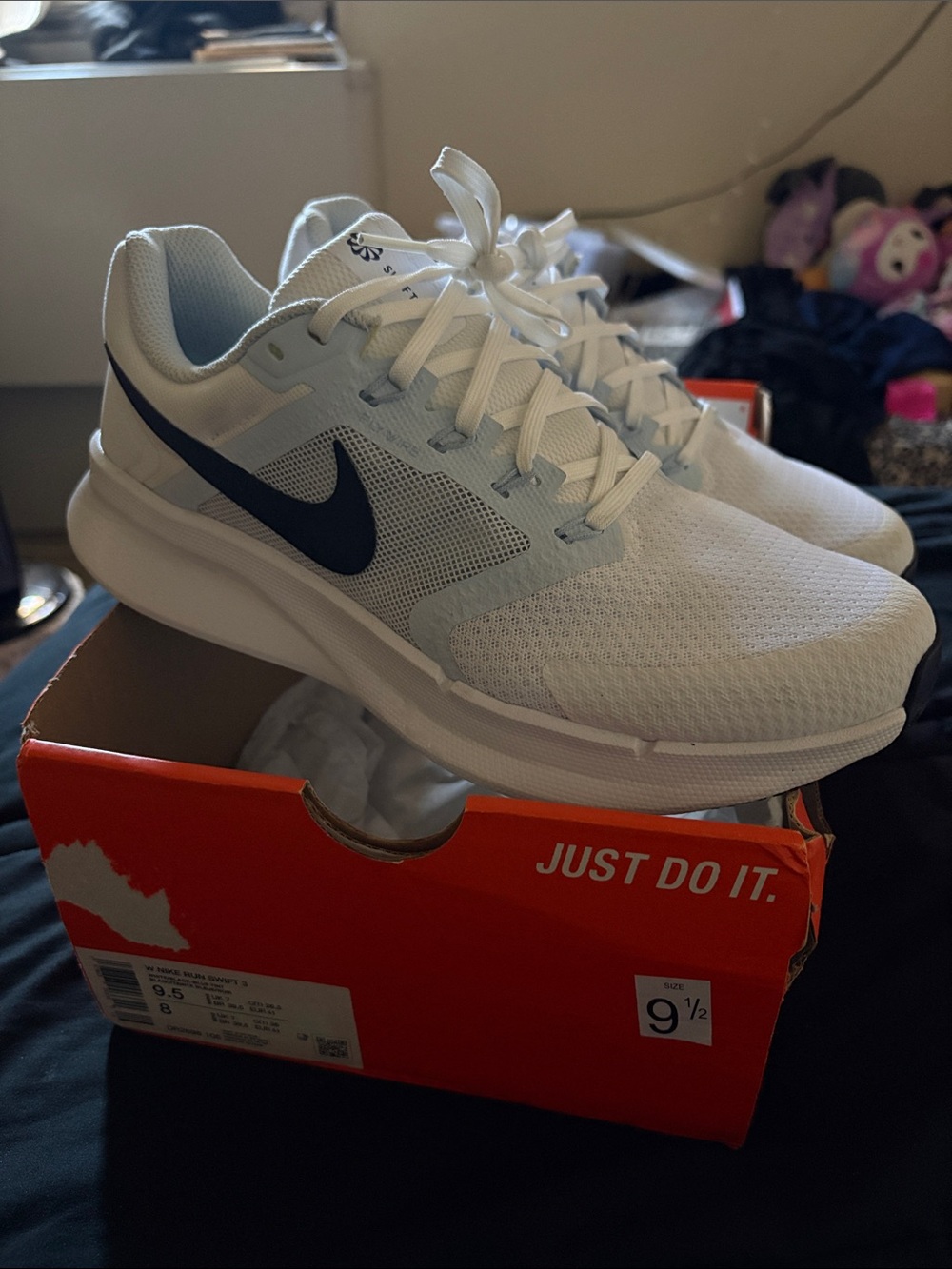 Nike White and Black women’s Running Sneakers